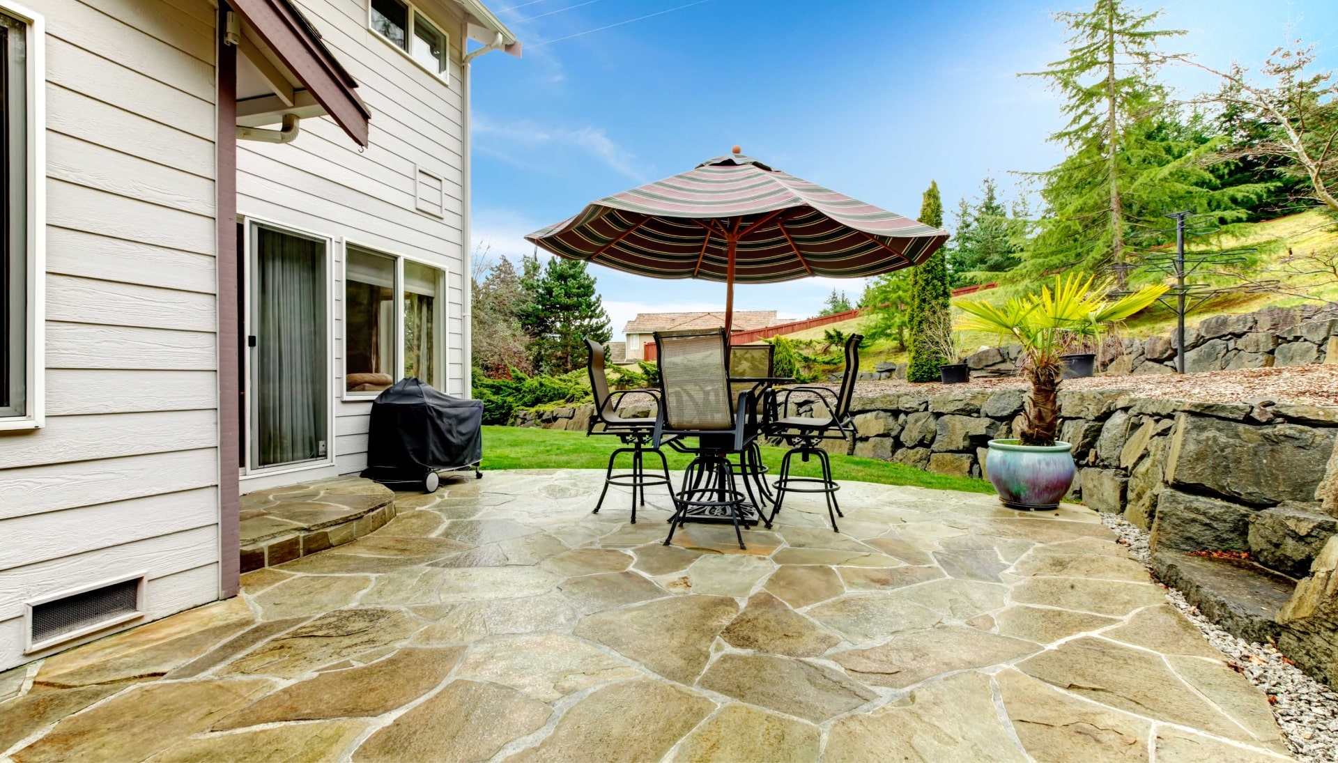 Create an Outdoor Oasis with Stunning Concrete Patio in Harrisburg, PA - Enjoy Beautifully Textured and Patterned Concrete Surfaces for Your Entertaining and Relaxation Needs.