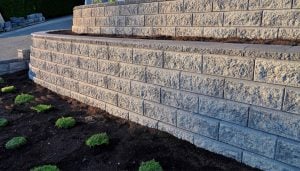 Strengthen Your Landscape and Prevent Erosion with Durable Concrete Retaining Walls in Harrisburg, PA - Choose from Various Styles, Colors, and Finishes to Achieve a Custom and Functional Concrete Wall System that is Long-Lasting, Low-Maintenance, and Complements Your Property.